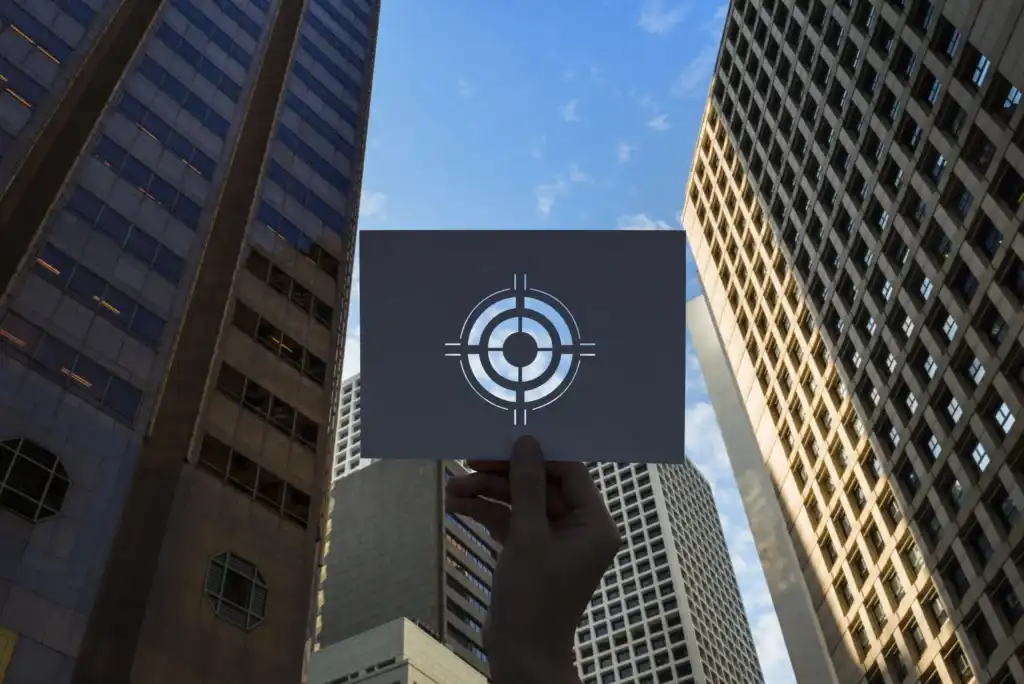 Conceptual image of a target symbol against a city skyline, representing the mission and vision of a leading interior fit-out contractor in Dubai.